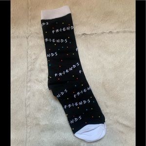 Never worn Friends logo pair of socks